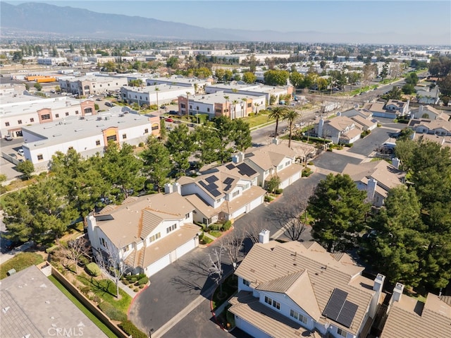 birds eye view of property with a residential view and a mountain view