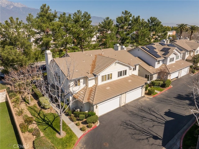 aerial view with a residential view and a mountain view