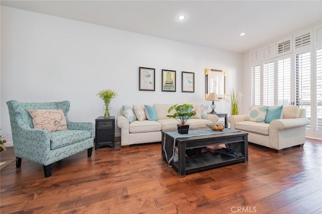 living room featuring recessed lighting and wood finished floors