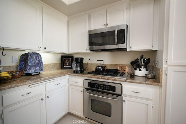 kitchen with white cabinets and stainless steel appliances