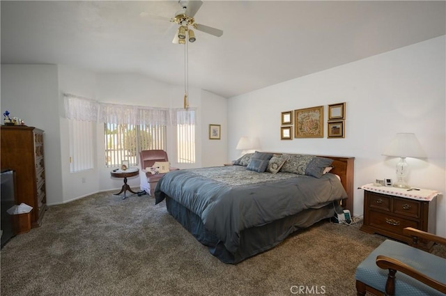 carpeted bedroom featuring a ceiling fan, baseboards, and vaulted ceiling