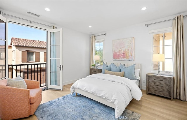 bedroom featuring baseboards, recessed lighting, visible vents, and light wood-style floors