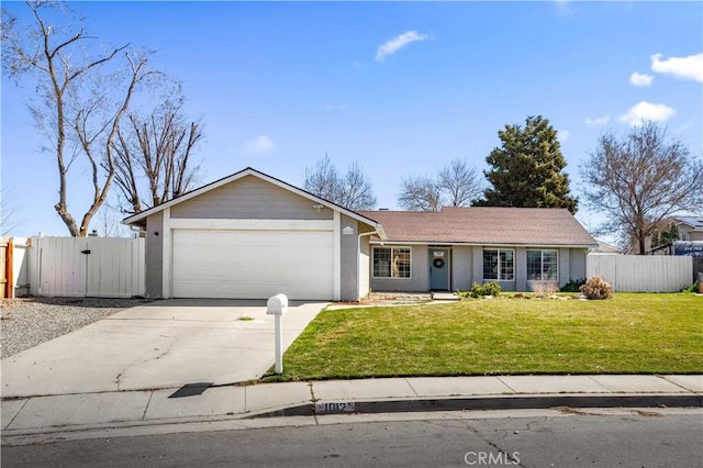 single story home featuring an attached garage, fence, concrete driveway, and a front yard