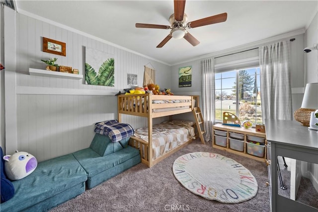 bedroom with ornamental molding, carpet flooring, and ceiling fan