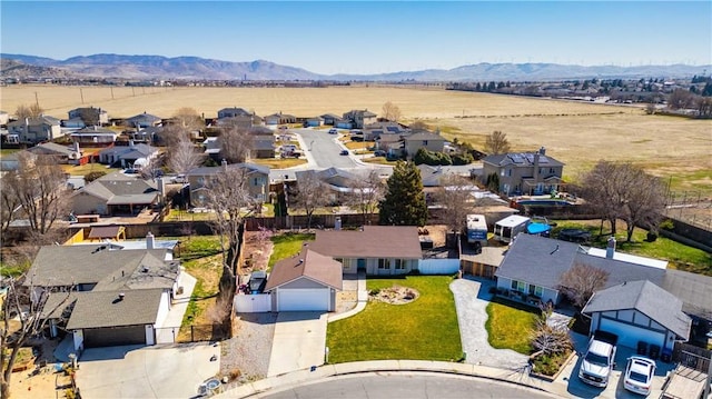 bird's eye view featuring a residential view and a mountain view