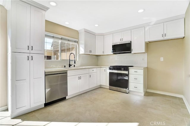 kitchen featuring a sink, light countertops, stainless steel dishwasher, tasteful backsplash, and gas range oven