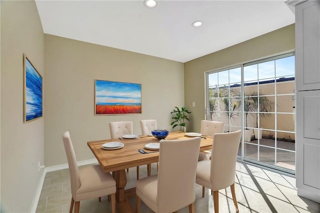 dining area with light tile patterned floors, recessed lighting, and baseboards