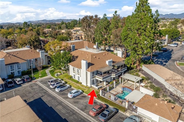 bird's eye view with a residential view and a mountain view