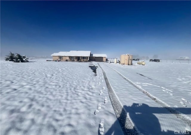 view of yard covered in snow