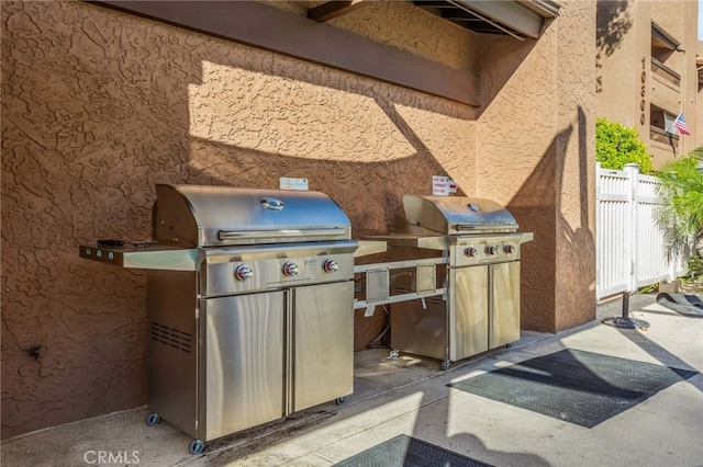 view of patio / terrace featuring fence and area for grilling