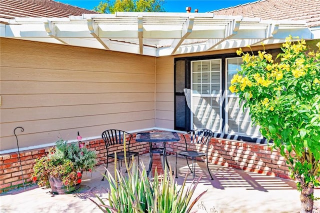 view of patio featuring a pergola