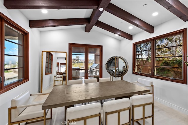 dining area with lofted ceiling with beams, recessed lighting, baseboards, and french doors