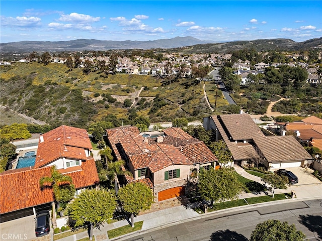 birds eye view of property featuring a residential view and a mountain view