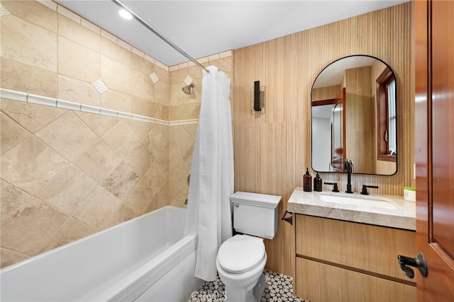 full bath with vanity, shower / bath combination with curtain, and toilet