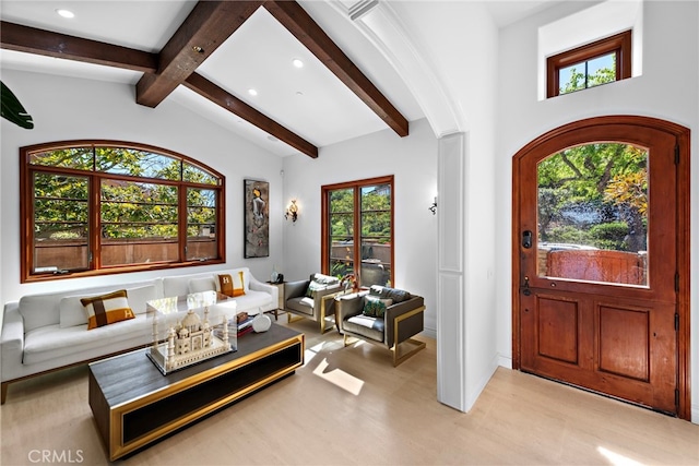 foyer featuring recessed lighting and lofted ceiling with beams