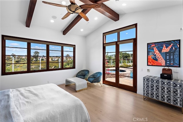 bedroom featuring french doors, vaulted ceiling with beams, recessed lighting, wood finished floors, and access to outside