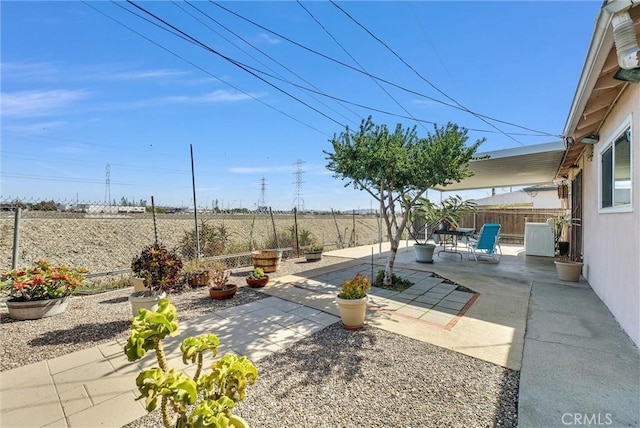 view of yard with a patio area and a fenced backyard