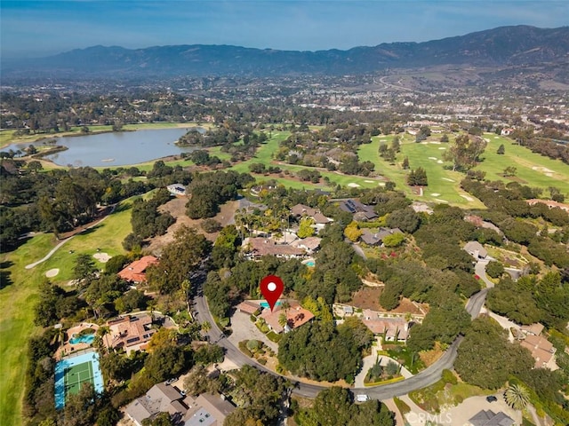 aerial view featuring a residential view and a water and mountain view