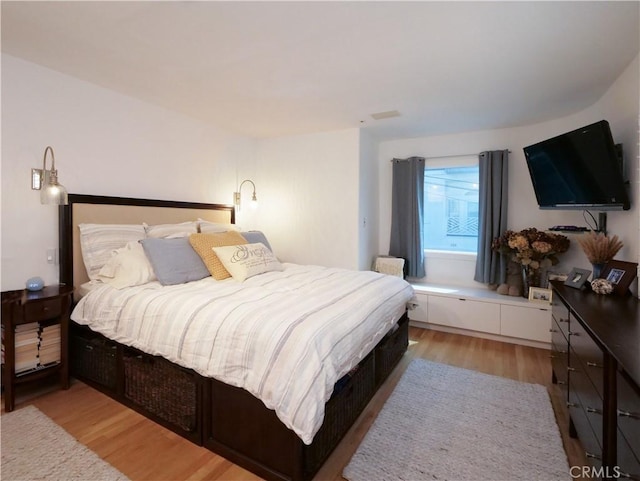 bedroom with light wood-style flooring