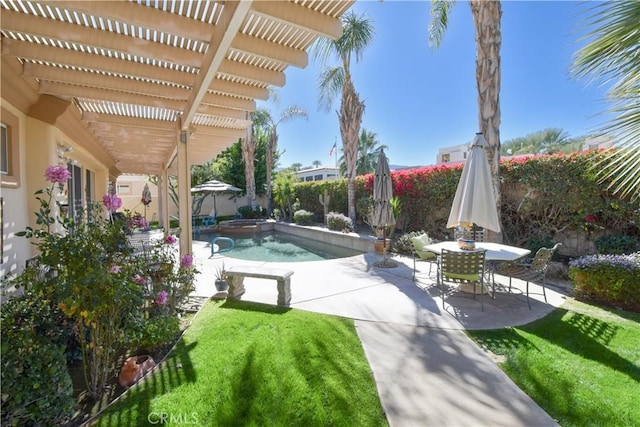 view of pool featuring a pool with connected hot tub, a fenced backyard, a patio, and a pergola