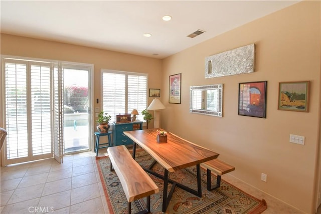 dining space with recessed lighting, visible vents, baseboards, and light tile patterned floors