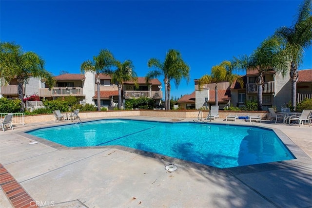 community pool featuring a patio