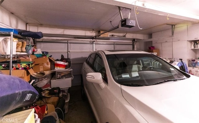 garage featuring a garage door opener