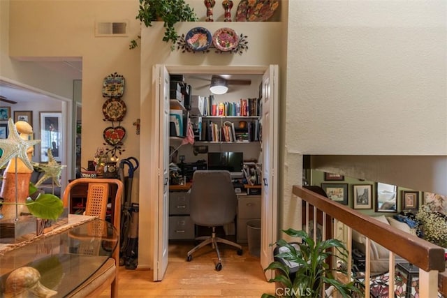 office featuring wood finished floors and visible vents