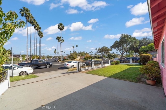 uncovered parking lot with fence