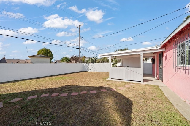 view of yard featuring a fenced backyard