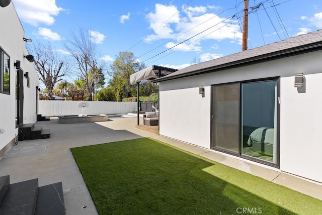 view of yard with a patio area and a fenced backyard