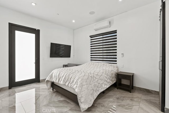 bedroom with recessed lighting and a wall mounted air conditioner