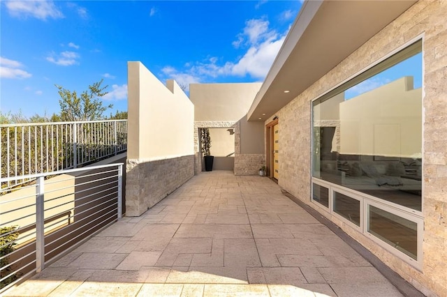 view of patio / terrace with a balcony