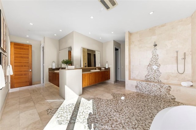 full bath with recessed lighting, visible vents, tiled shower, and vanity