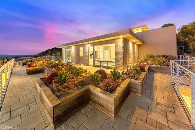 exterior space with a patio area and fence