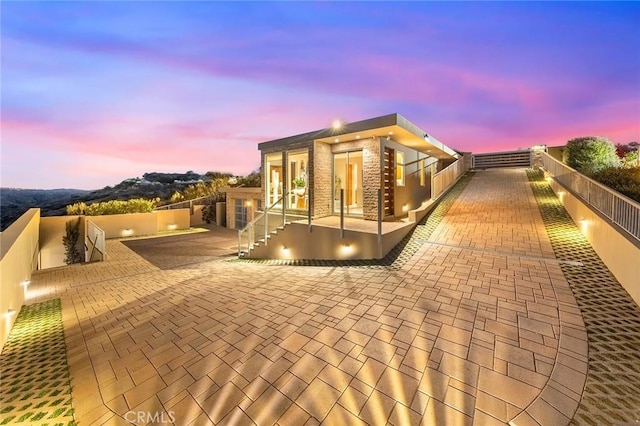 exterior space with a patio area and fence