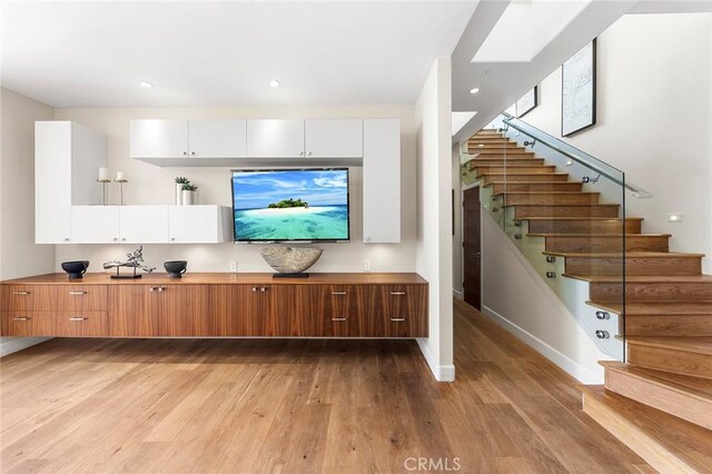 3355 Alta Laguna Blvd, Laguna Beach, CA 92651 - living area with stairway, light wood-style flooring, and recessed lighting