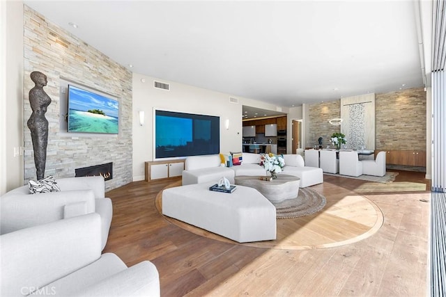 3355 Alta Laguna Blvd, Laguna Beach, CA 92651 - living room featuring hardwood / wood-style floors and a fireplace