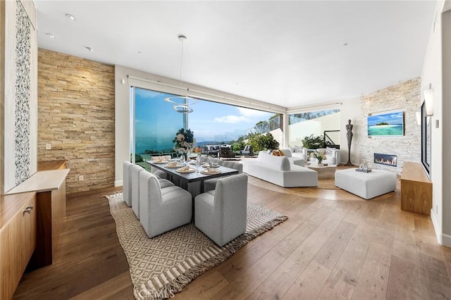 3355 Alta Laguna Blvd, Laguna Beach, CA 92651 - living room with hardwood / wood-style flooring and a stone fireplace
