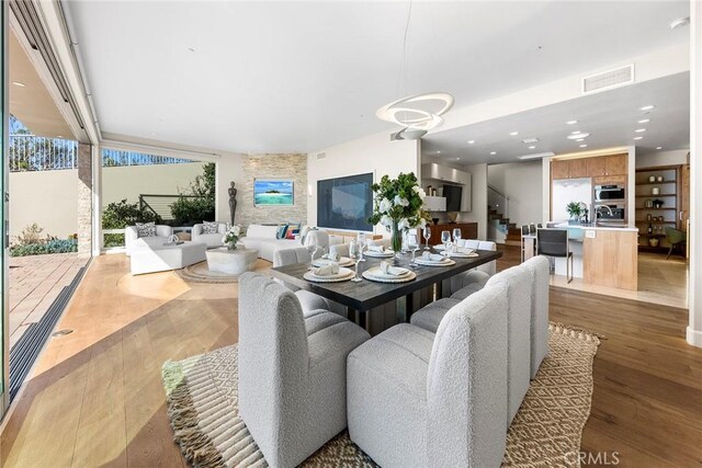 3355 Alta Laguna Blvd, Laguna Beach, CA 92651 - dining room featuring wood finished floors and recessed lighting
