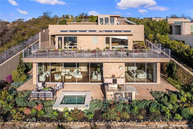 3355 Alta Laguna Blvd, Laguna Beach, CA 92651 - back of property with an in-ground hot tub, a patio, and outdoor dining area