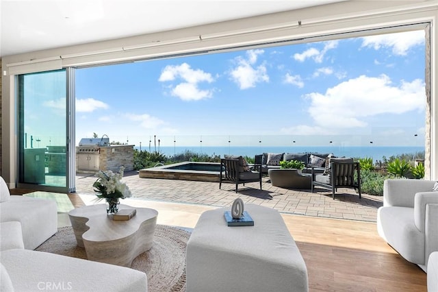 3355 Alta Laguna Blvd, Laguna Beach, CA 92651 - living room featuring wood finished floors and a water view