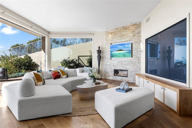 3355 Alta Laguna Blvd, Laguna Beach, CA 92651 - living area featuring a stone fireplace and wood finished floors