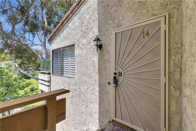 22809 Hilton Head Dr Unit 14, Diamond Bar, CA 91765 - view of exterior entry featuring stucco siding