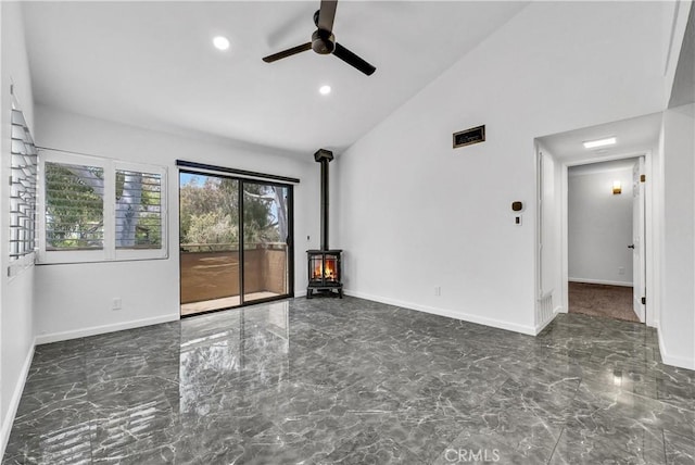 22809 Hilton Head Dr Unit 14, Diamond Bar, CA 91765 - spare room with a wood stove, marble tiled flooring, a ceiling fan, baseboards, and recessed lighting
