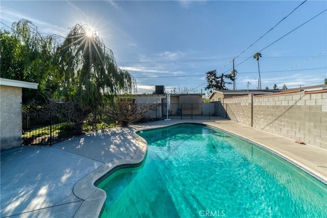 view of pool with a fenced in pool, a patio, and a fenced backyard