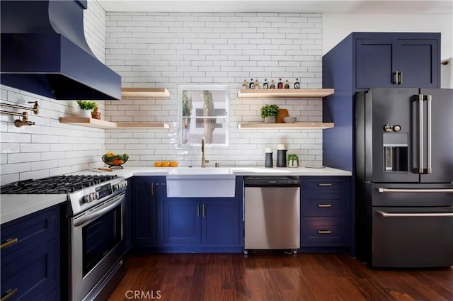 kitchen featuring open shelves, appliances with stainless steel finishes, exhaust hood, and light countertops