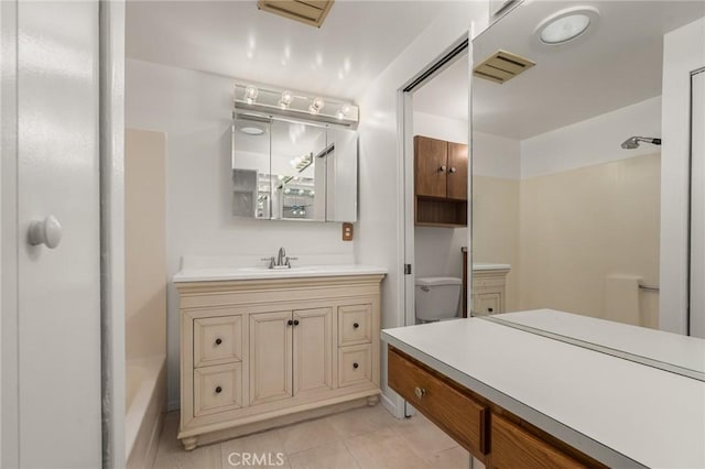 bathroom featuring visible vents, a shower, toilet, tile patterned flooring, and vanity