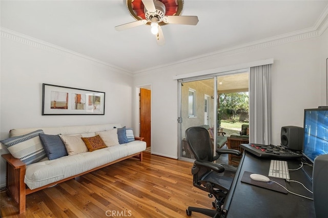 office with ceiling fan, ornamental molding, and wood finished floors