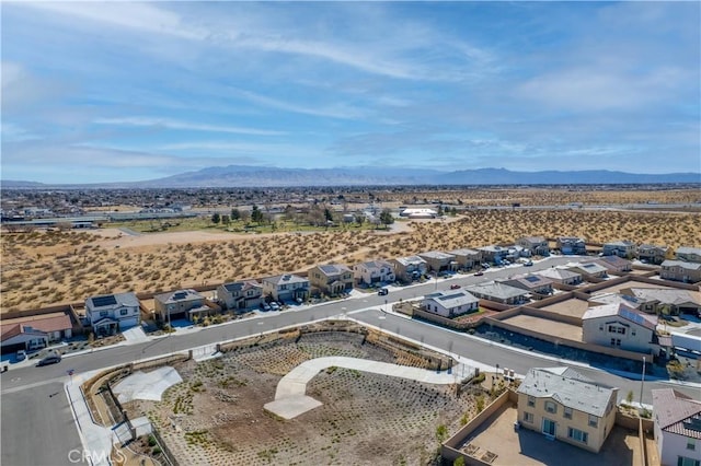 bird's eye view featuring a residential view and a mountain view